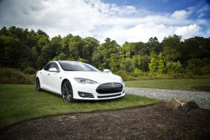 Tesla Car in an open field